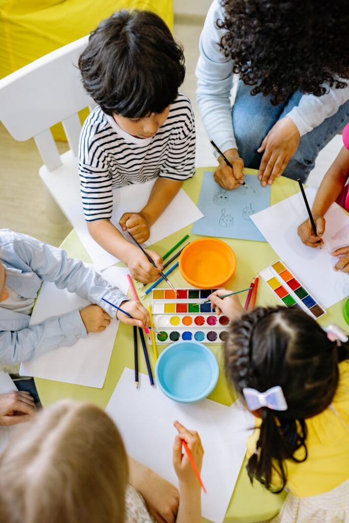 children painting with water colors 8612967